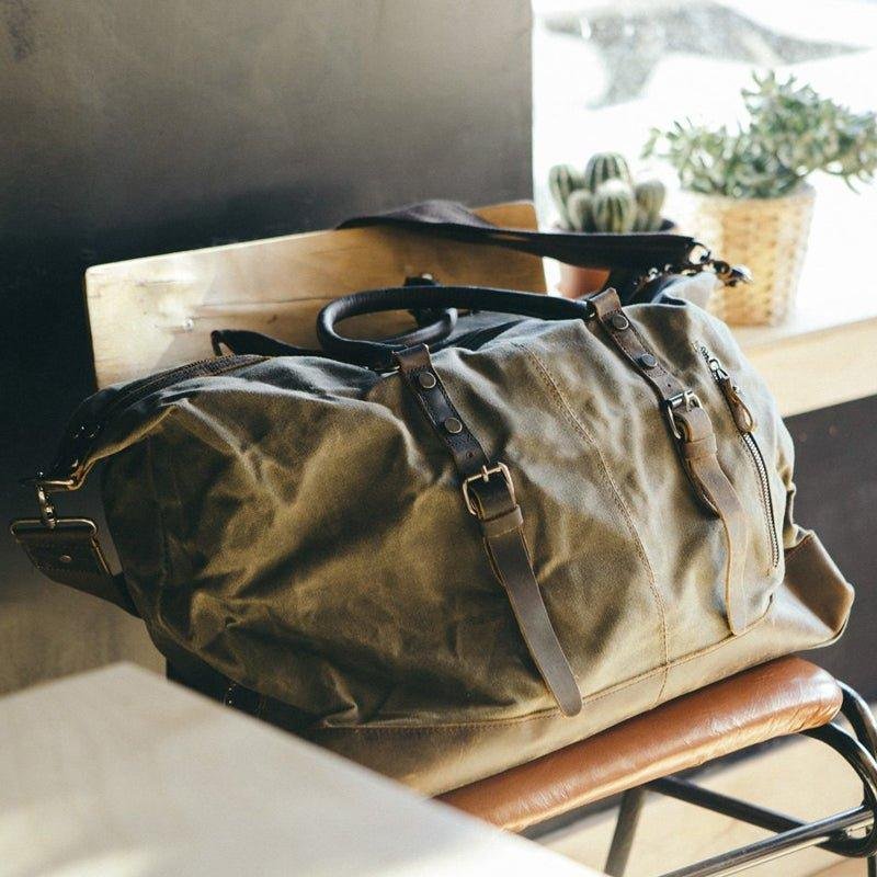 Woosir waxed canvas weekender bag on a chair