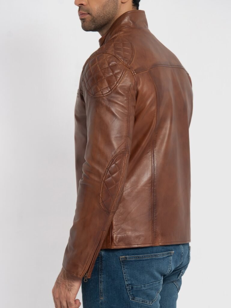 Side profile view showing tailored fit of cognac leather café racer jacket