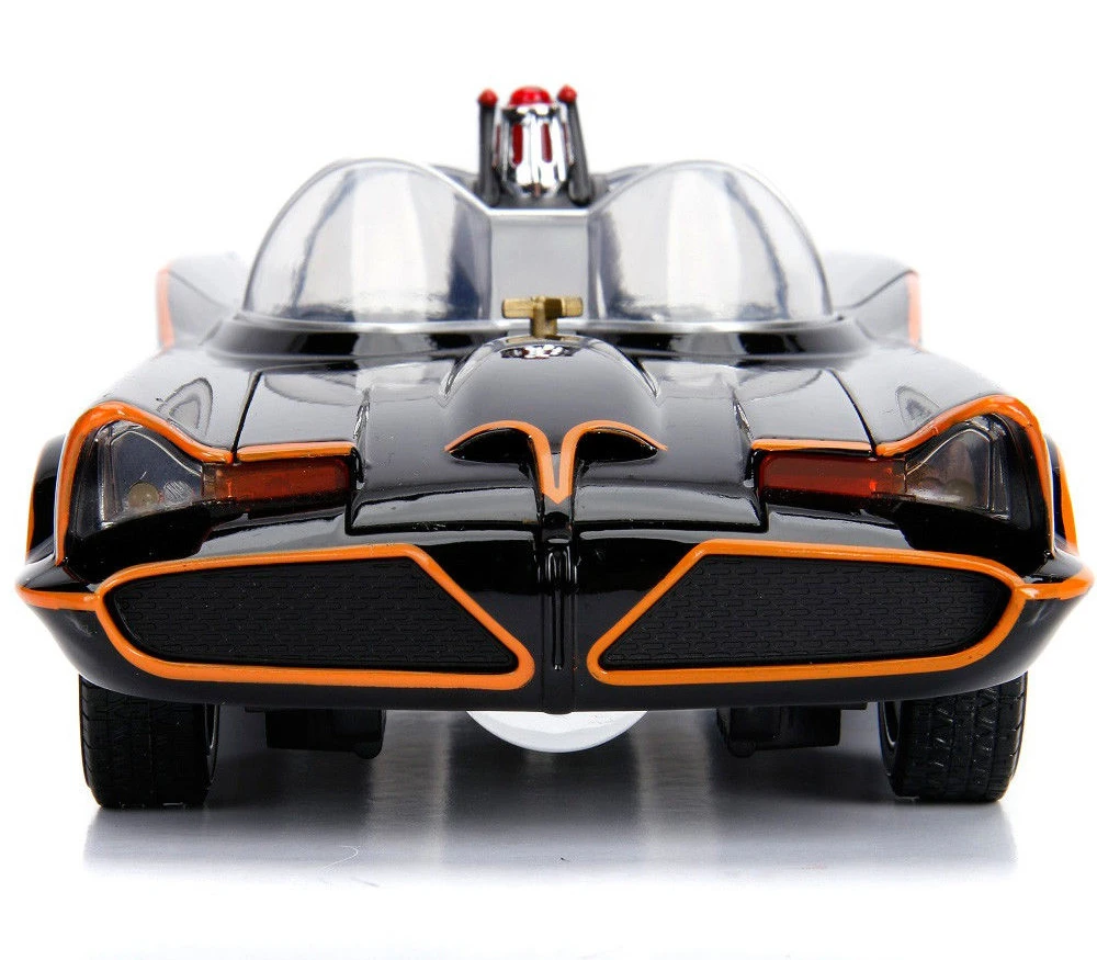 Front three-quarter view of the Jada 1:18 scale Classic TV Series Batmobile diecast model with black body and orange accents